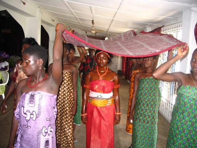 A Bride under a Shade with Her Bridemaids