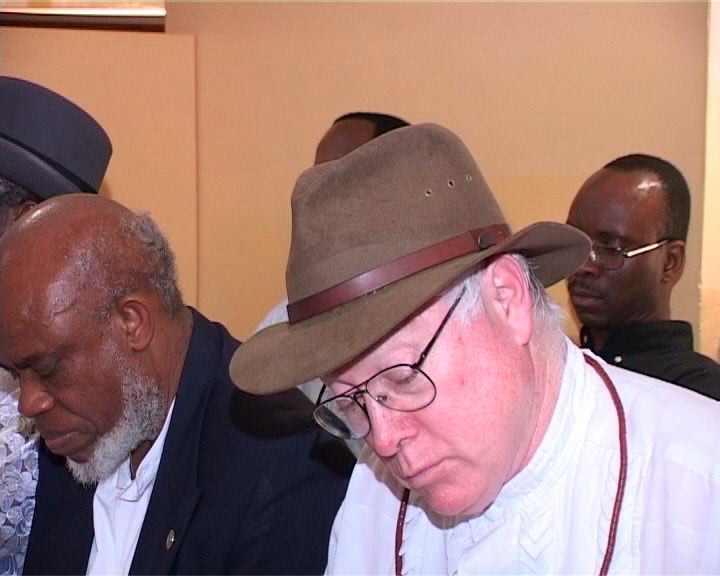 Professor Ajovi Scott-Emuakpor and Professor Perkins Foss, both from the US, at a moment of Prayer